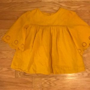 Yellow long sleeve shirt